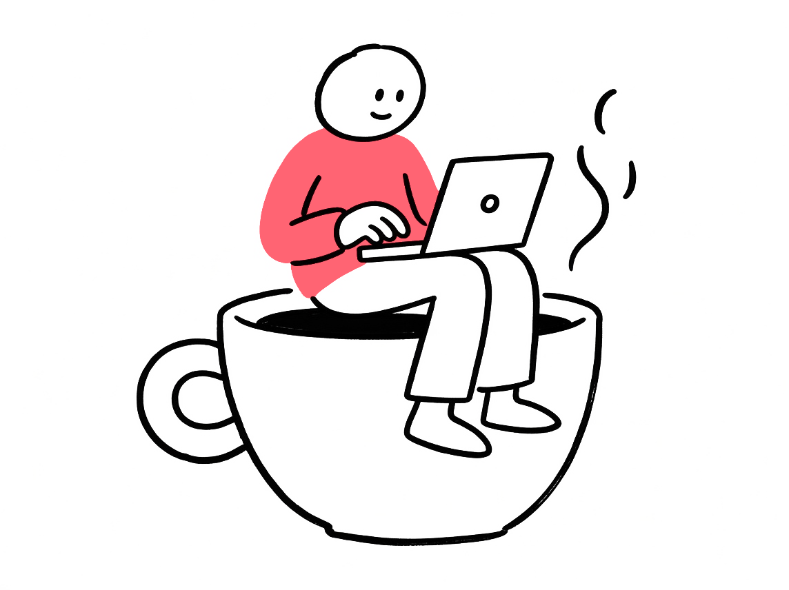 Person sitting on a giant coffee cup with a laptop