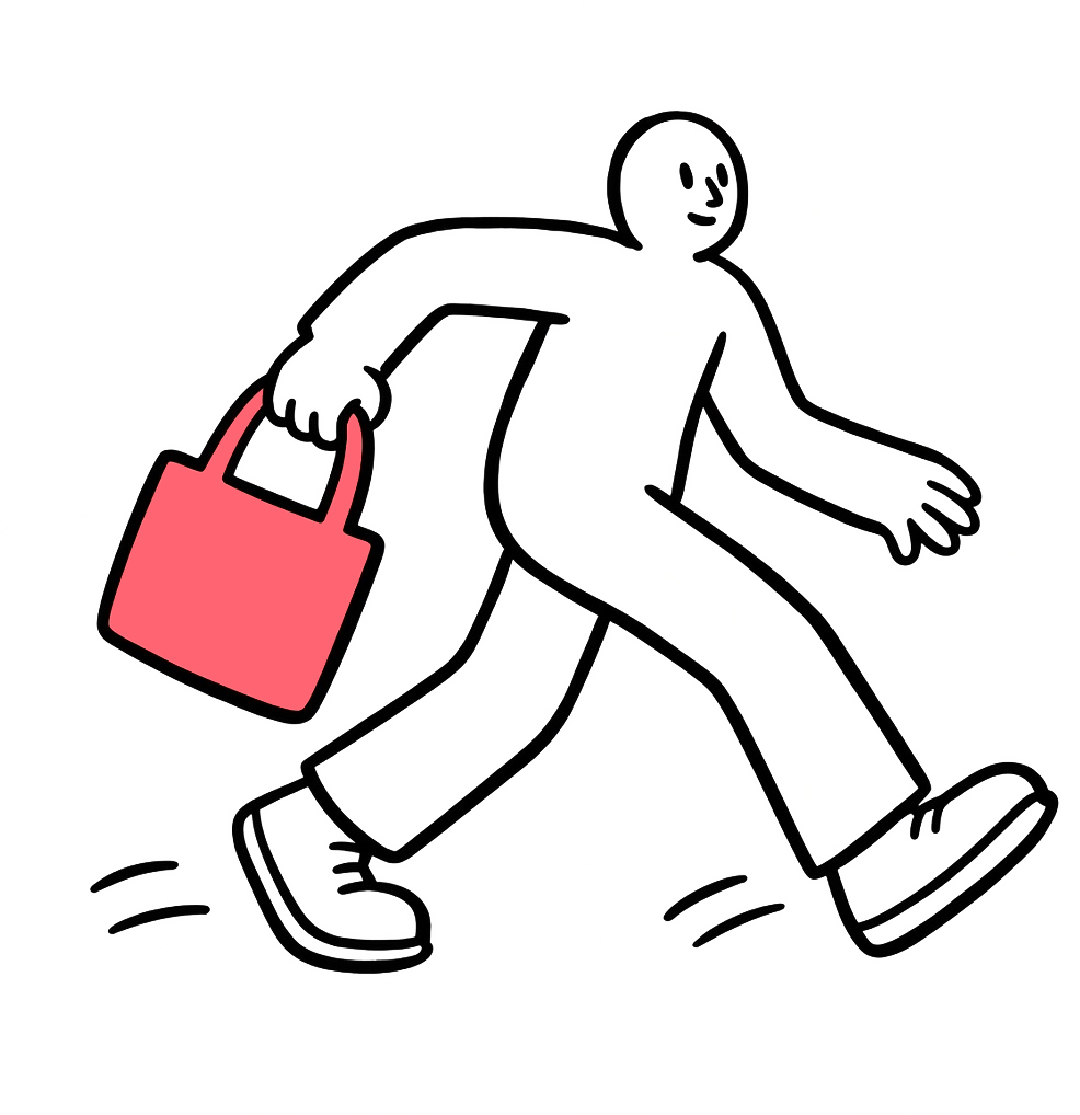 Person walking briskly with a tote bag